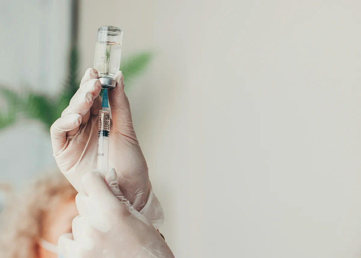 closeup of syringe and injection